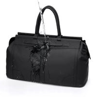 sac de voyage hydrophobe noir éclaboussé