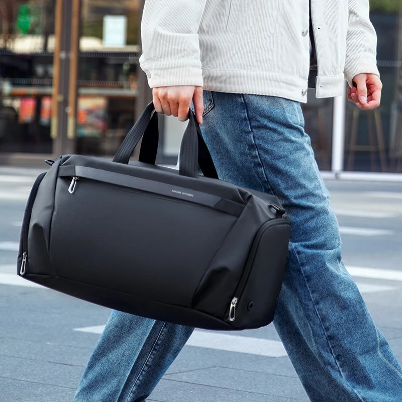 sac de voyage multifonctions porté par la poignée souple